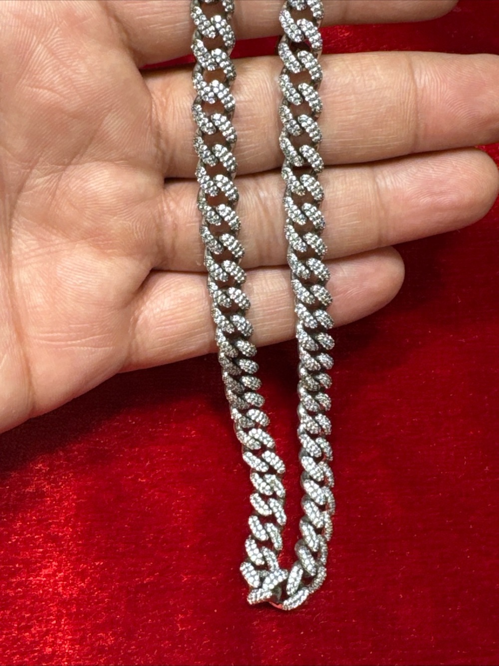 Pre-owned fashion Cuban-style chain with clear CZ-style stones and a silver-tone